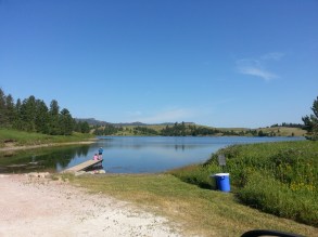 The kids fishing from the dock.